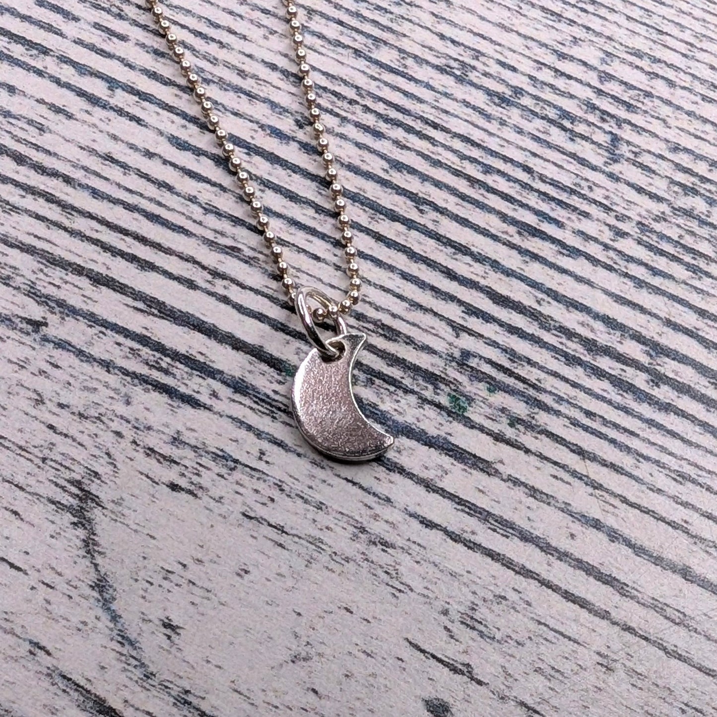 tiny moon pendant