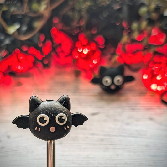 Roundy Bat needle toppers