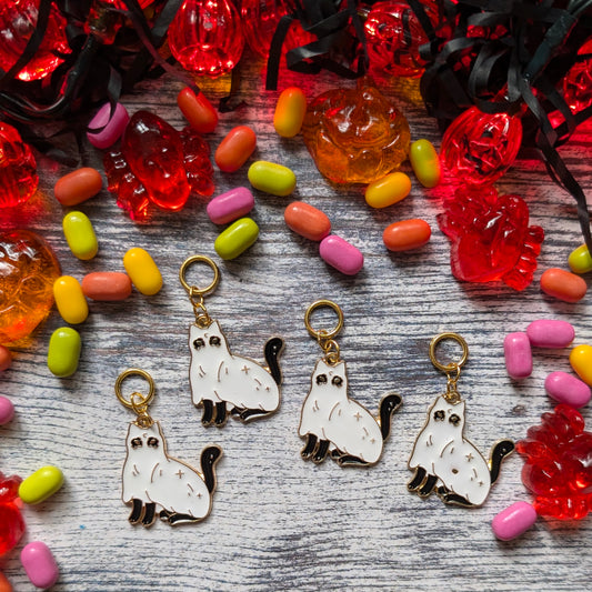 Cat in ghostie costume stitchmarkers