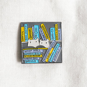 Cats and dogs in the library - enamel pin
