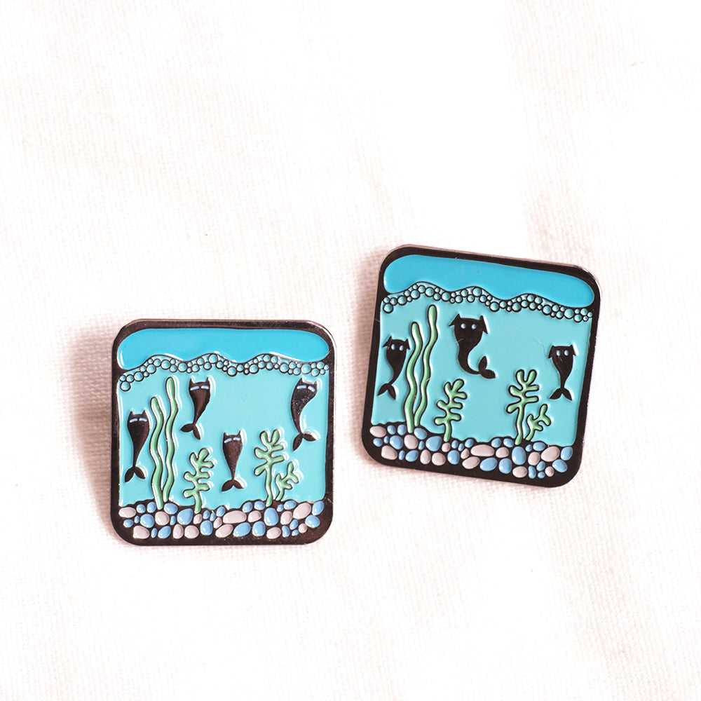 Mercat and merdog pins