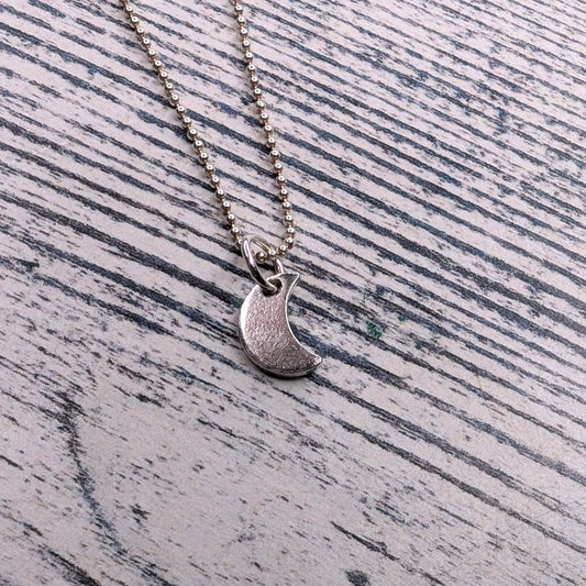 tiny moon pendant