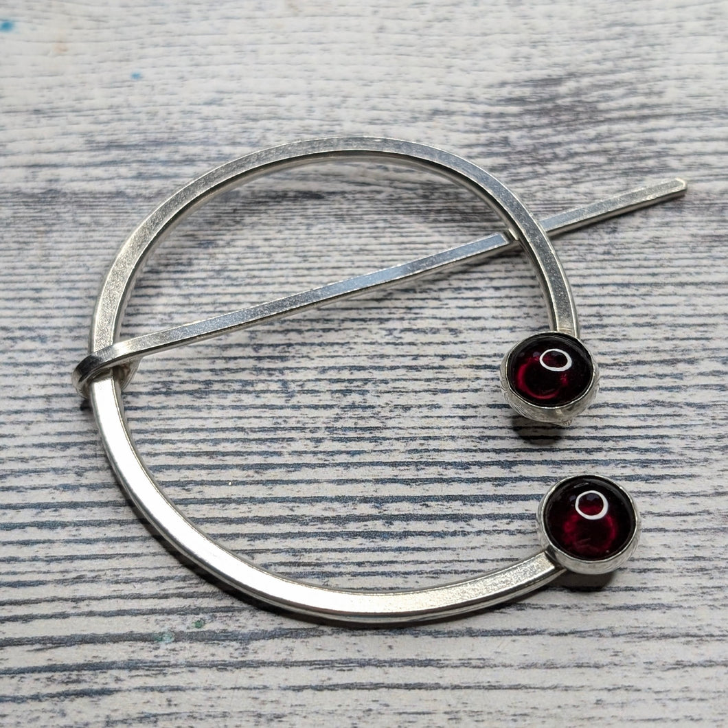 asymmetric garnet penannular pin