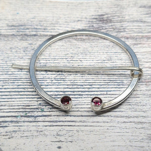 garnet penannular pin