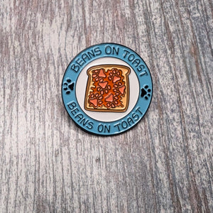 Beans on toast enamel pin