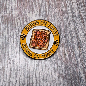 Beans on toast enamel pin