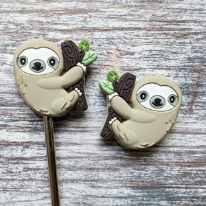 Sloth needle toppers