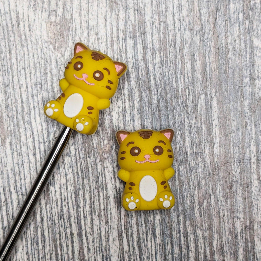 Tiny tiger needle toppers