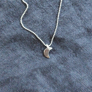 Tiny moon pendant