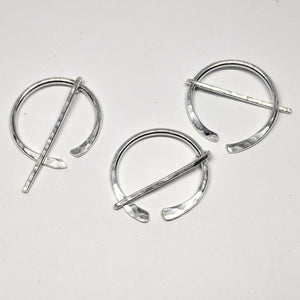 Little hammered silver penannular pin
