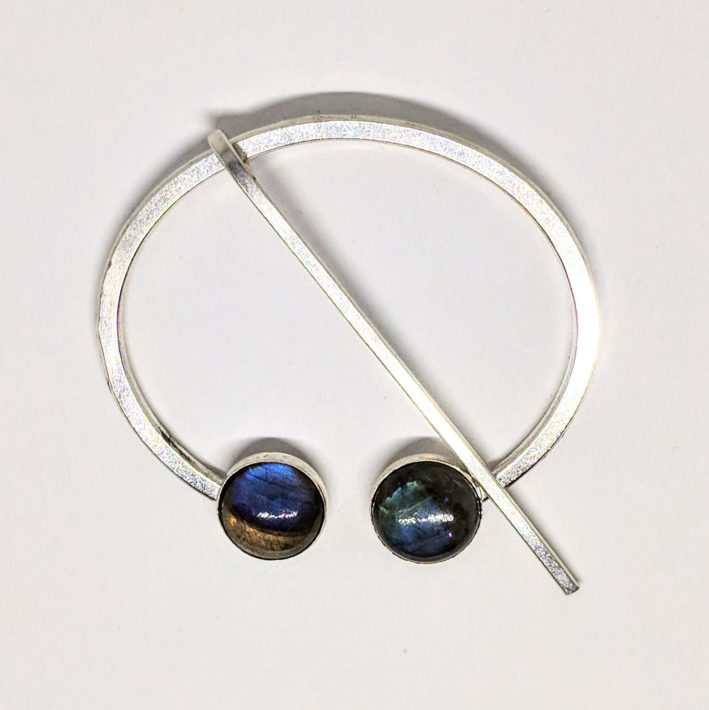 Large labradorite penannular pin