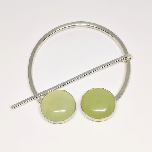 Serpentine penannular pin