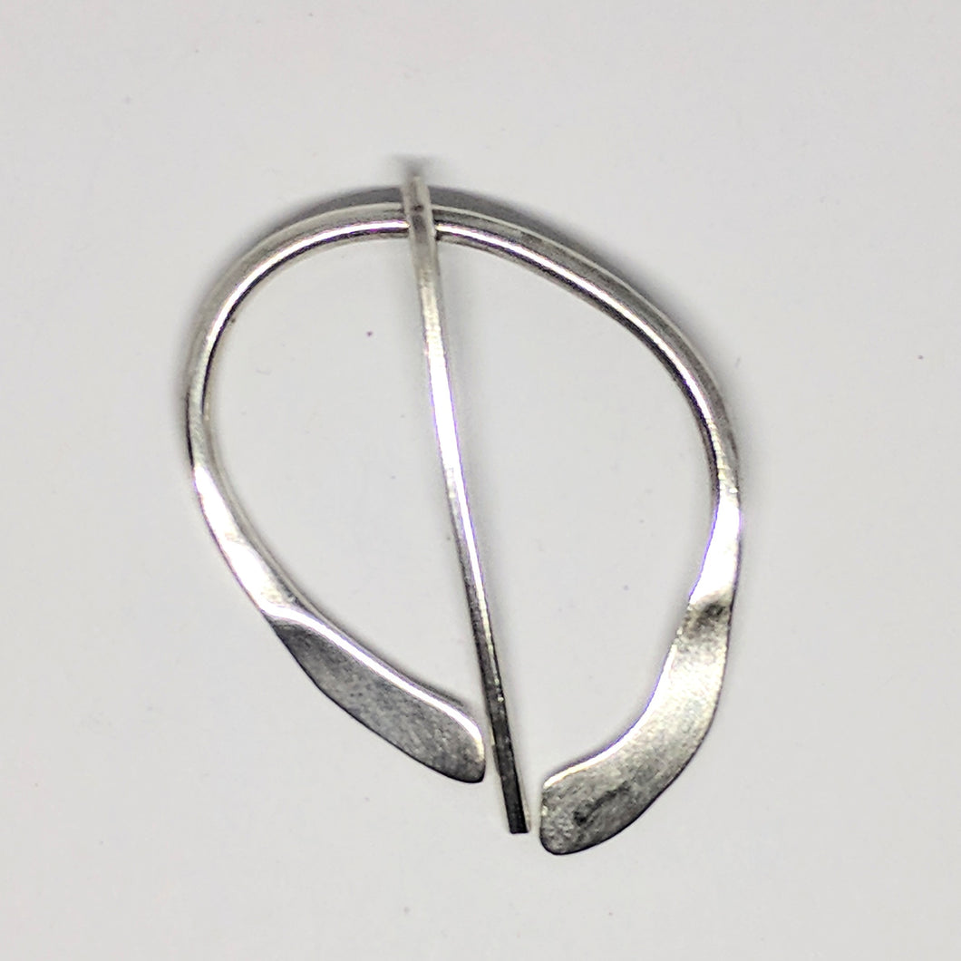 Large asymmetric silver penannular pin